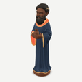 3D printed nativity figurine of Balthazar standing with a jar of myrrh, navy robe and crown