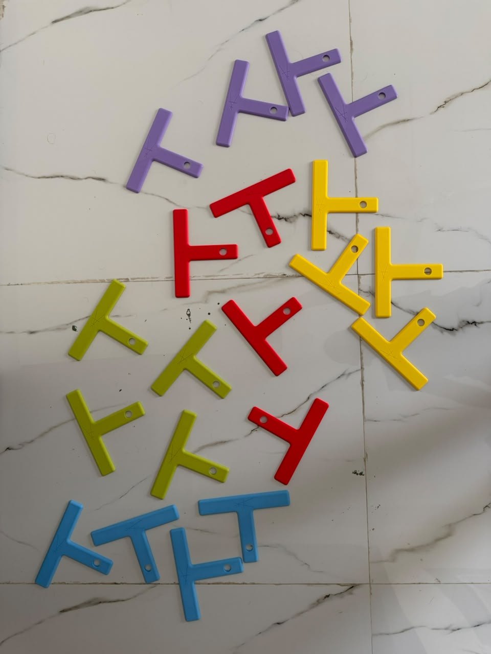 T Mark MK-i in red, purple, yellow, lime green and blue