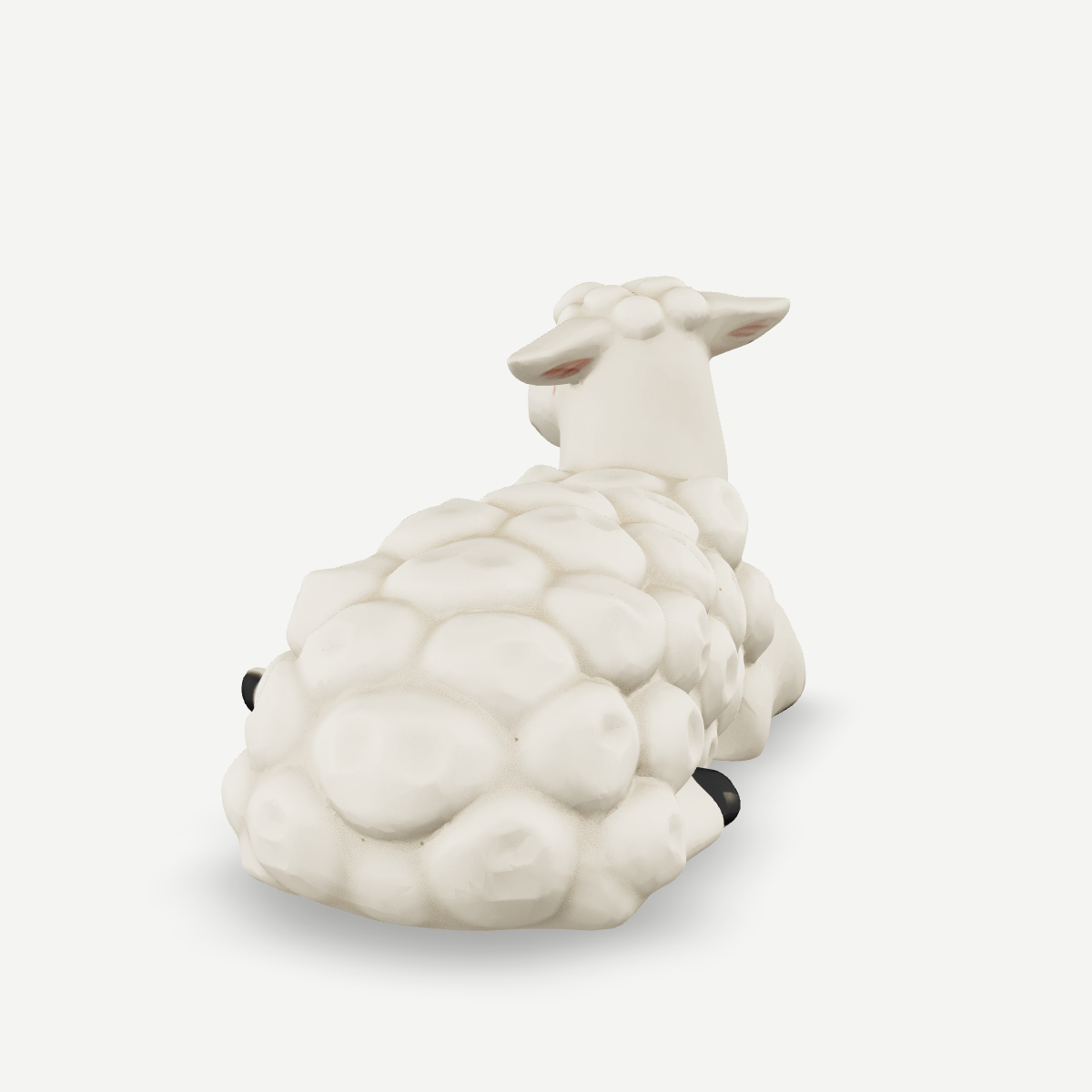 3D printed a woolly sheep lying down — back view