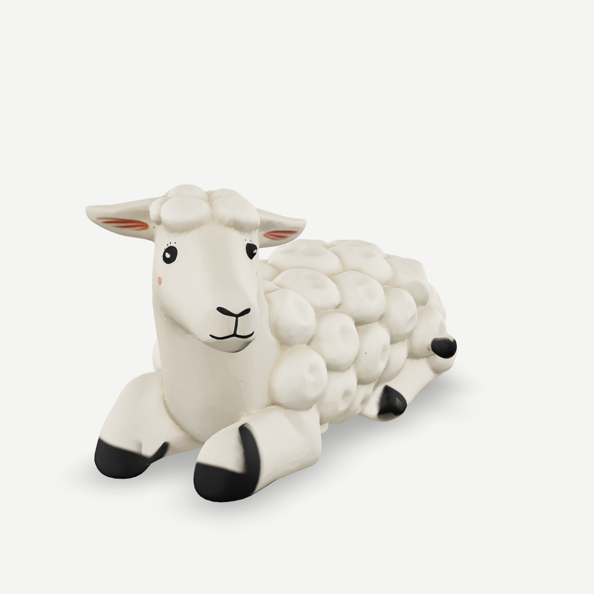 3D printed a woolly sheep lying down — front quarter view
